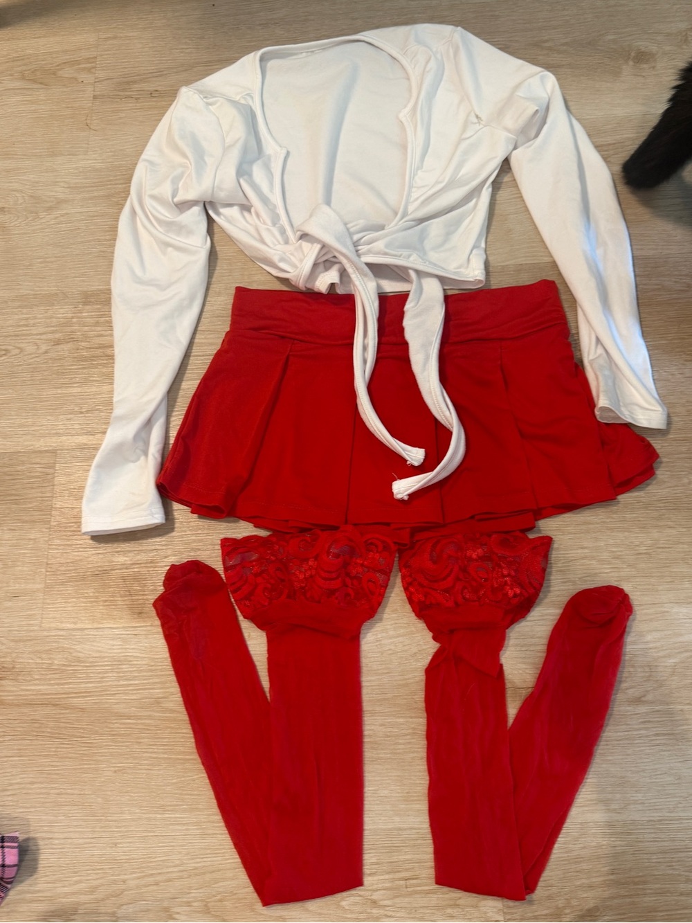 School girl outfit red micro skirt red stockings and white tie top Halloween